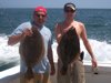 Greg and Ron with fluke to near 7 pounds.
