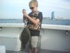 Owen with back bay flounder.