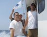 l-r:  Ed, Charlie and Joe raising the tuna flag.
