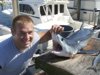 Andrew gets up close with a mako shark.